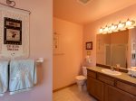 The upstairs bathroom has a large walk-in shower